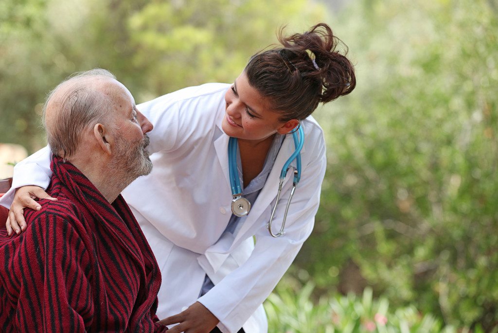 nurse with elderly patient